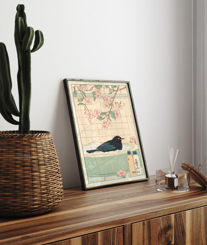 Framed bathroom decor featuring a blackbird in a calm, botanical bath scene