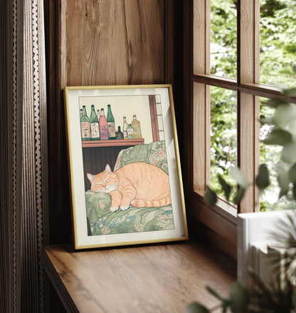 Framed art print of a relaxed orange cat napping peacefully beside sake bottles