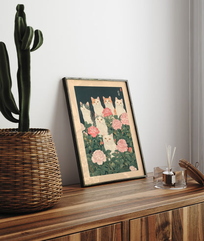 Cats in pink flower bushes – charming framed art print